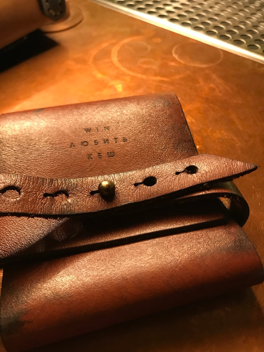 Check presenter, embossed mark detail