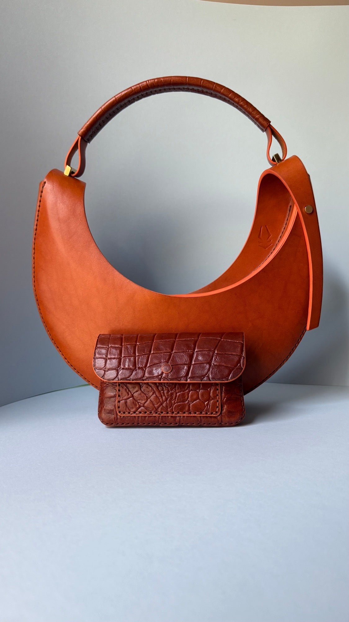 The Drop, IMP's signature half-moon bag