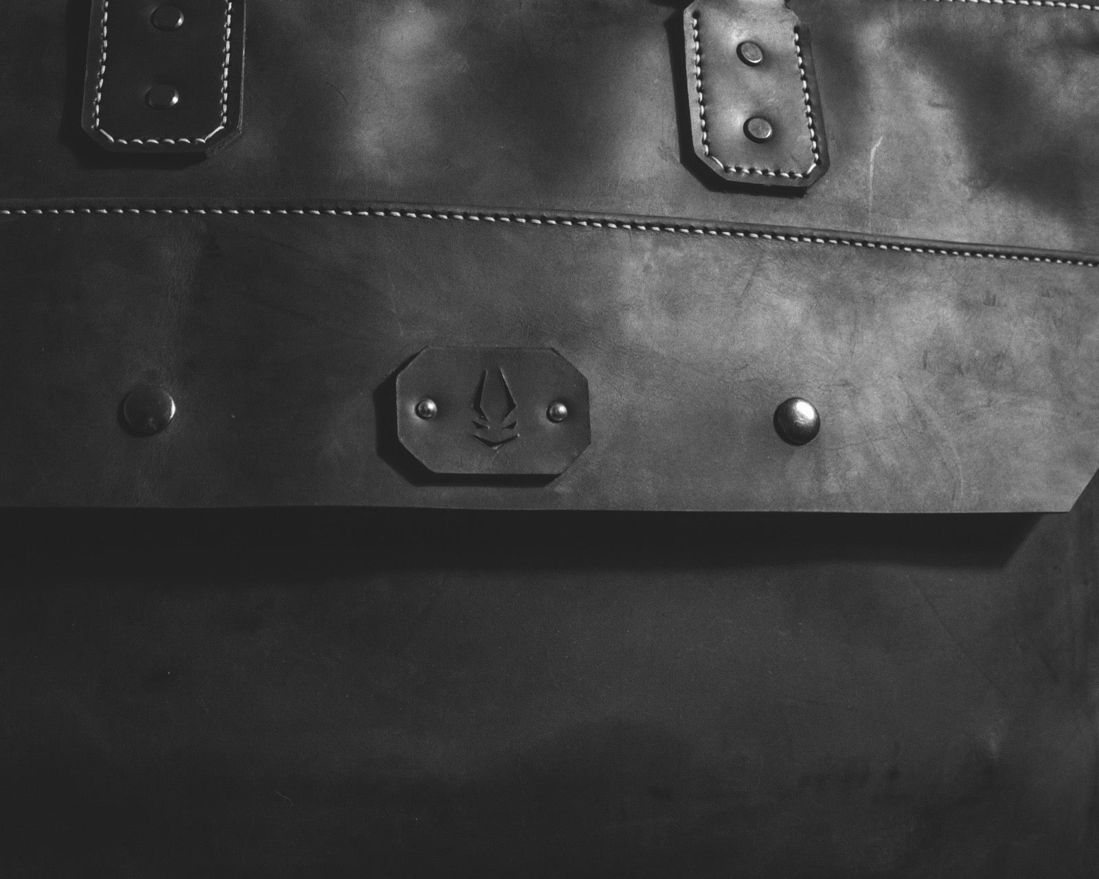 Embossed IMP medallion on the bag