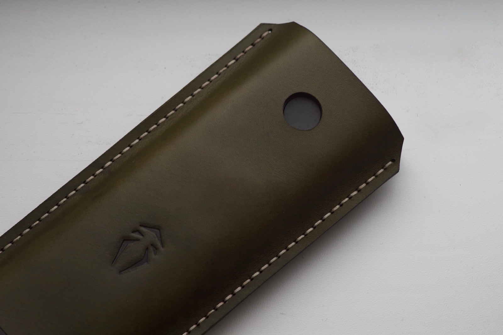 Olive leather power-bank case with port window