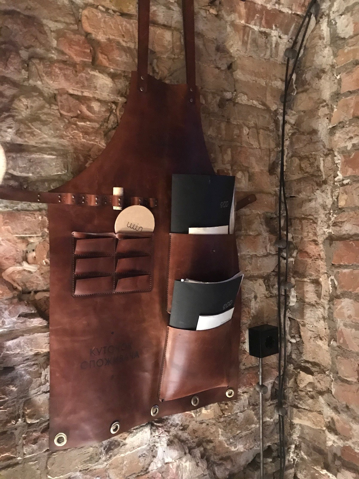 The WIN consumer corner laid flat, showing pockets and organiser